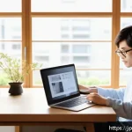 제품디자인 자격증의 학습 플랫폼 - A modern Japanese home study room scene with a young Japanese adult using a sleek laptop and smartph...